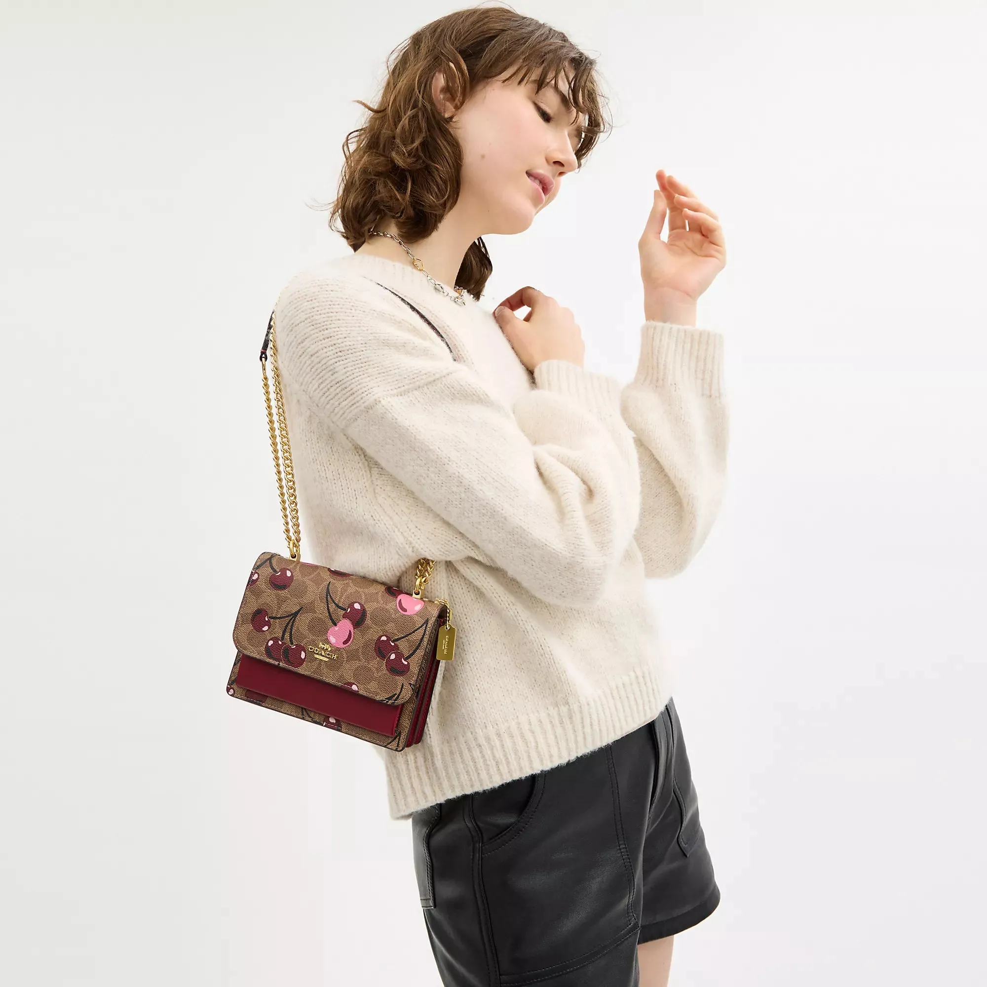 Coach Outlet Mini Klare Crossbody Bag In Signature Canvas With Cherry Print