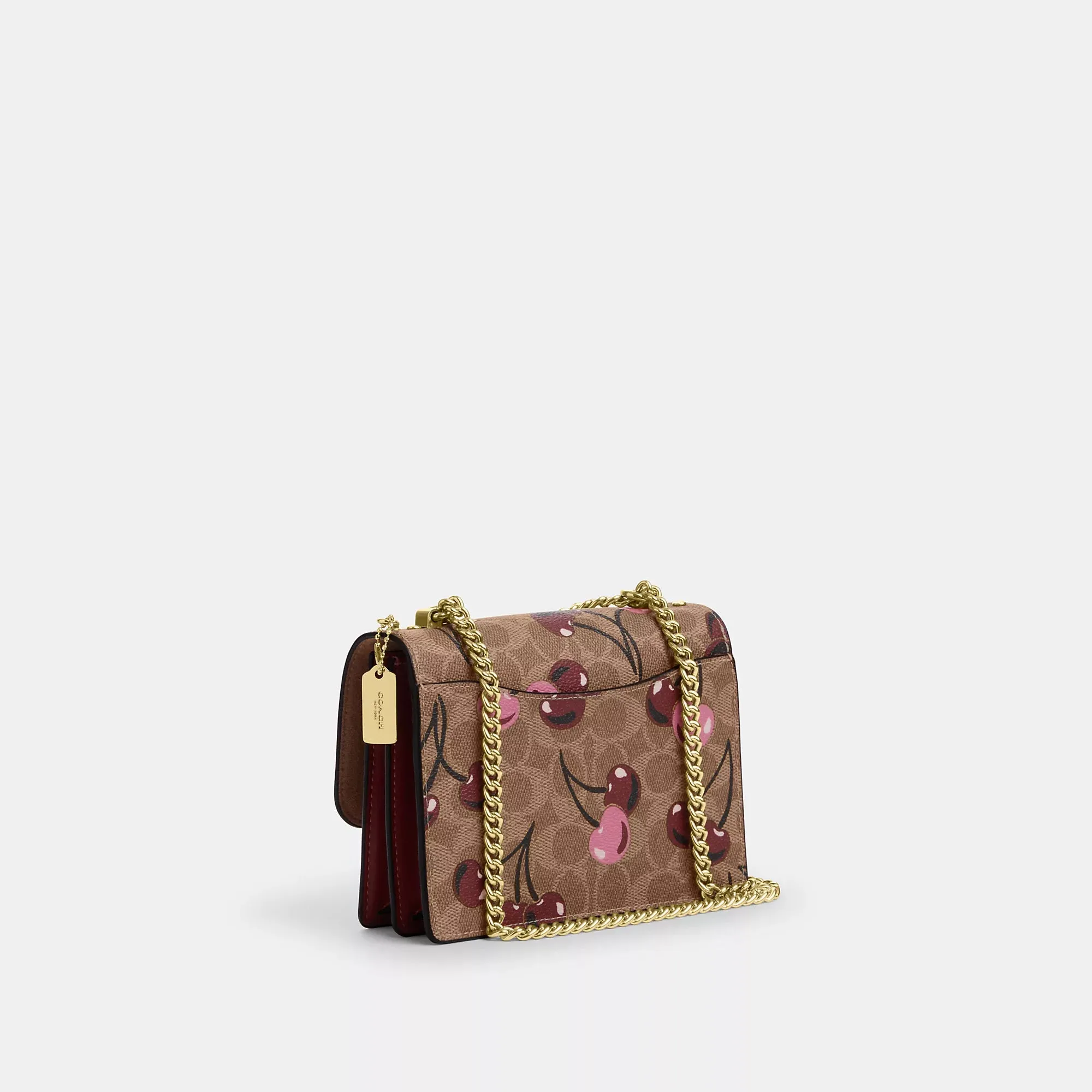 Coach Outlet Mini Klare Crossbody Bag In Signature Canvas With Cherry Print