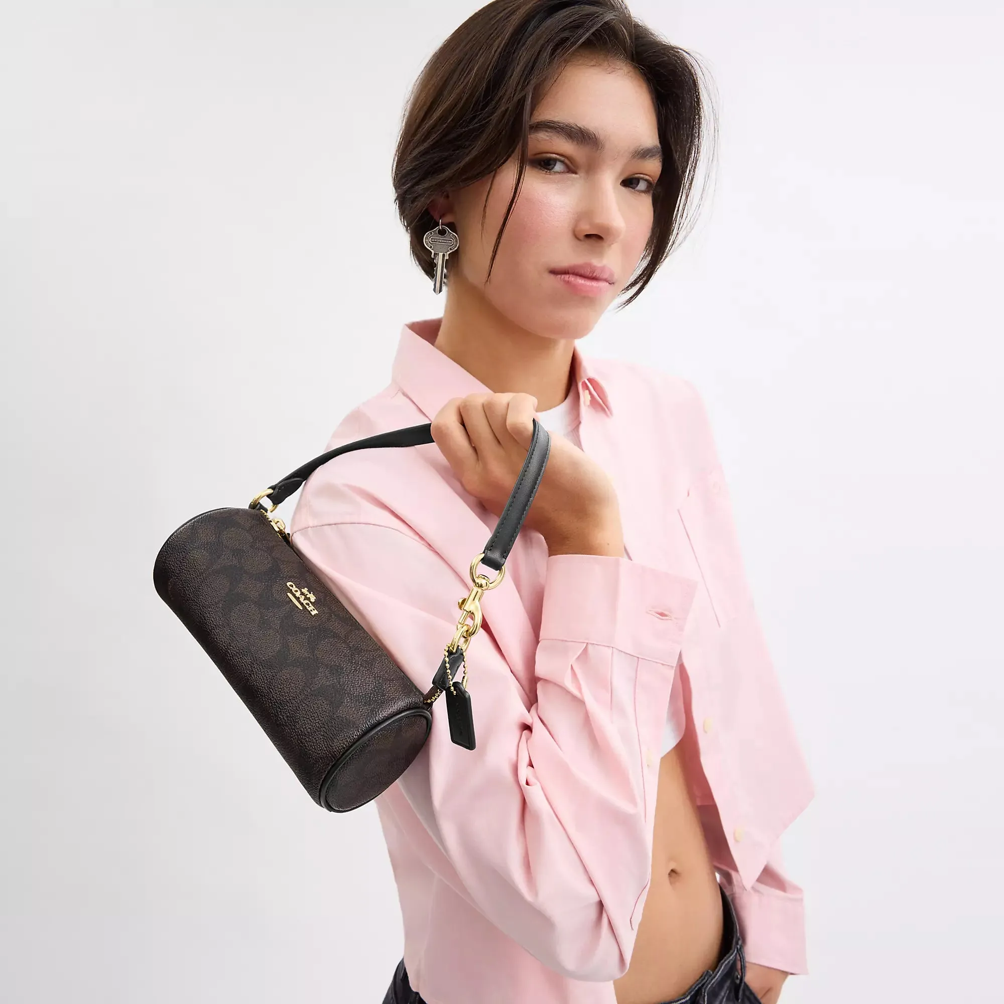 Coach Outlet Nolita Barrel Bag In Signature Canvas